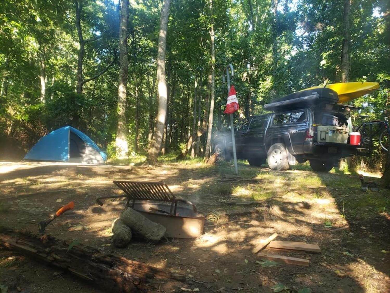 Site-5-at-Campfire-Lodgings-truck in campsite