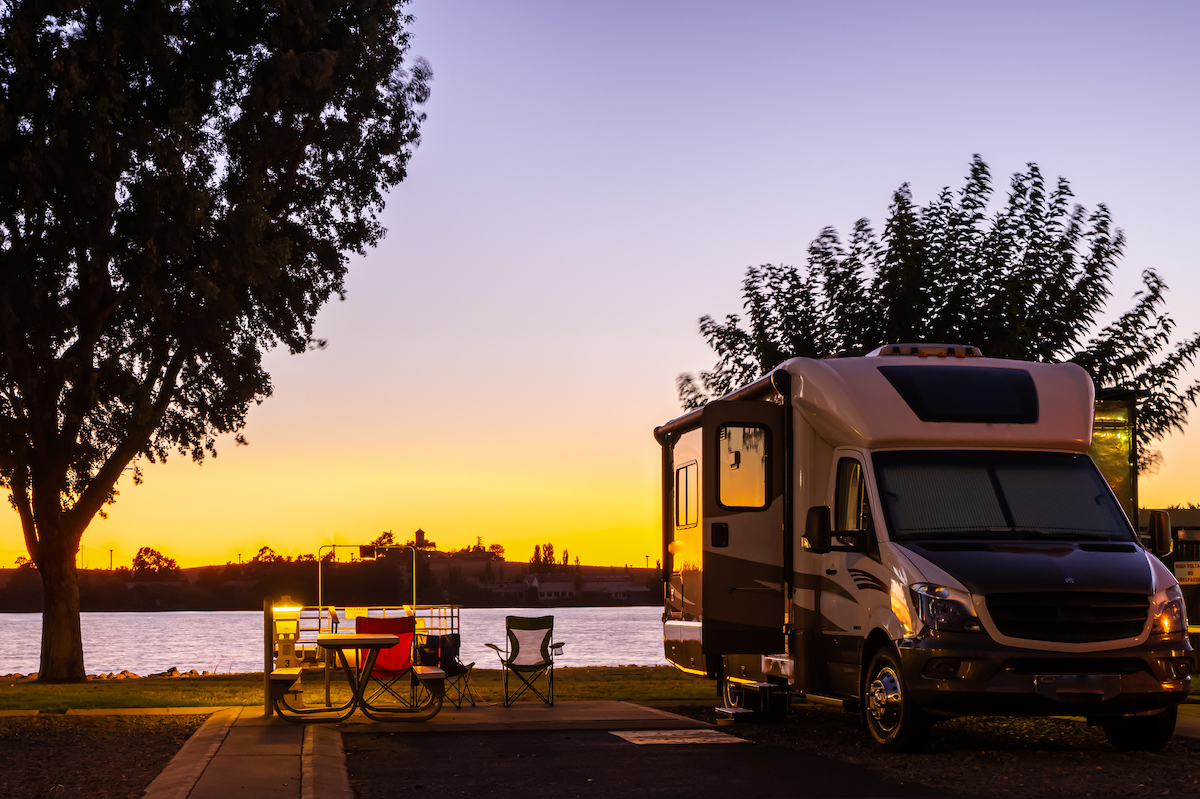 RV by lake at night