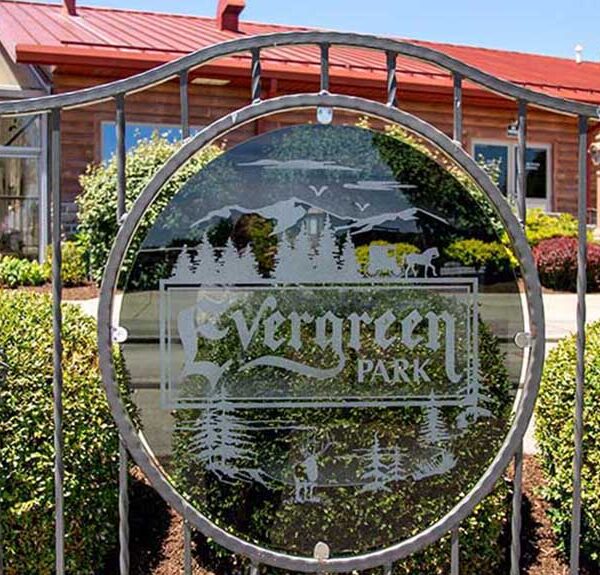 Sign proclaiming "Evergreen RV Resort"