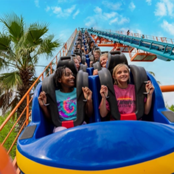 Family riding on a roller coaster