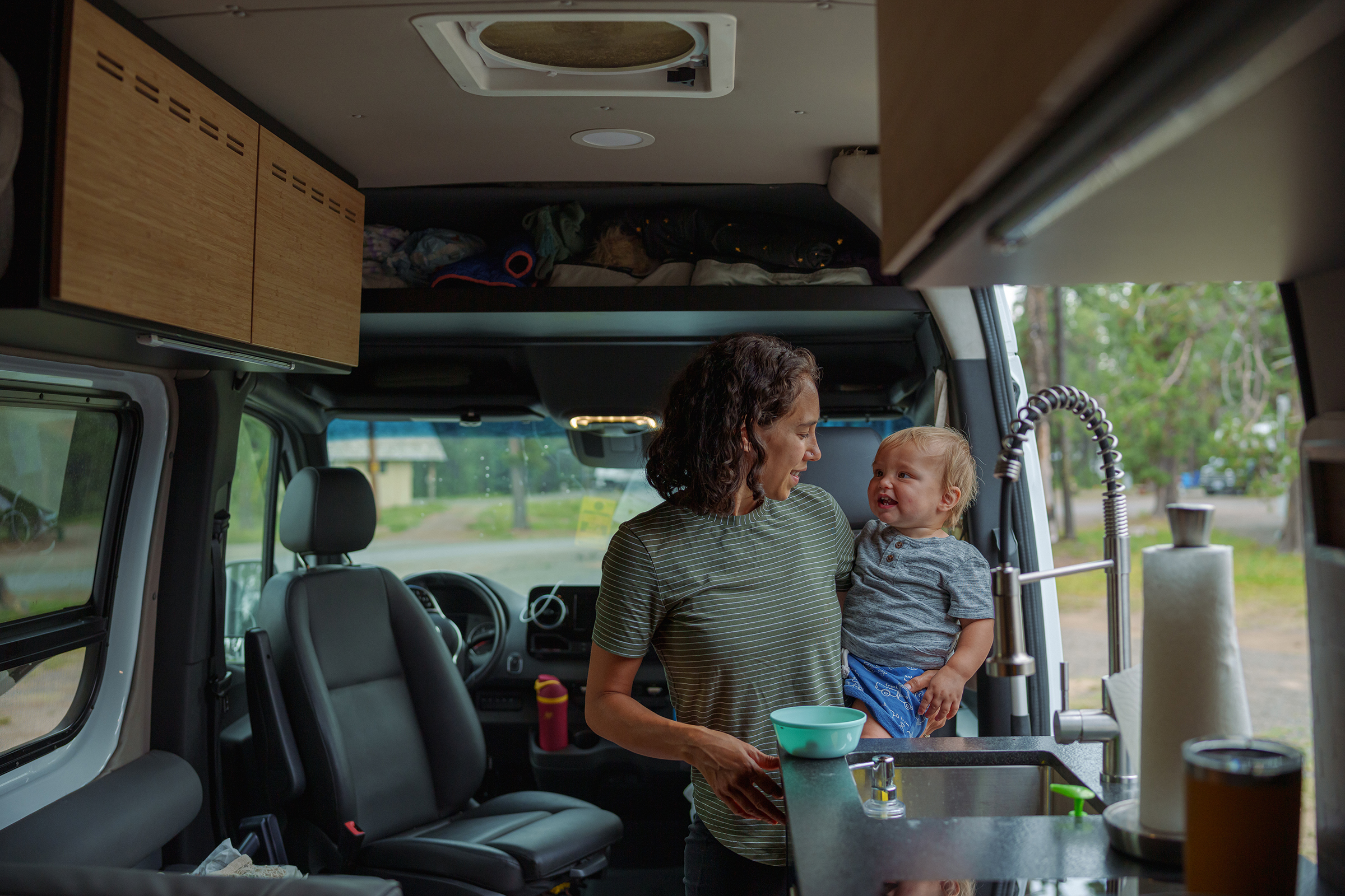 Mom and baby in campervan