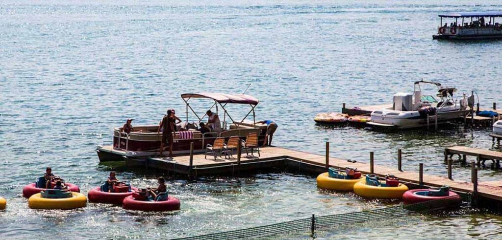 Boats docked in a lake.
