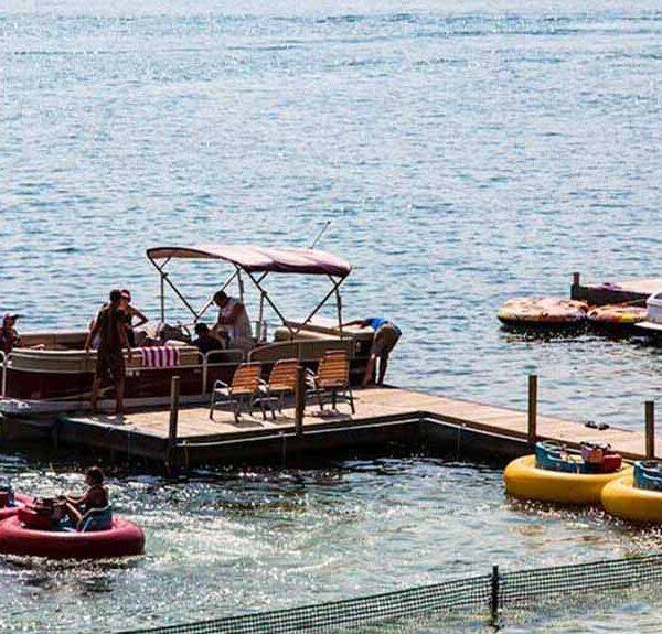 Boats docked in a lake.