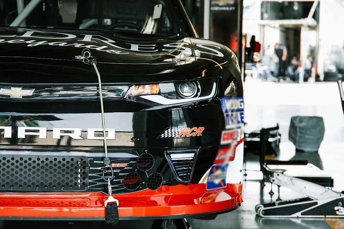 Stock car in garage.