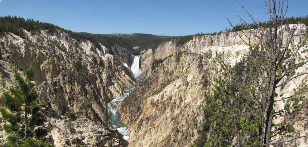 Majestic waterfall and canyon.