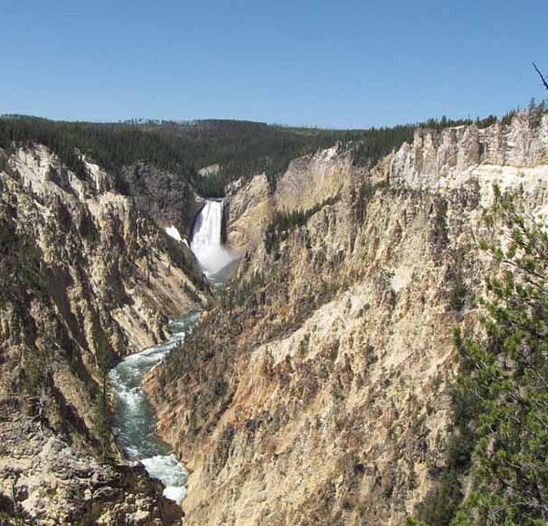 Majestic waterfall and canyon.