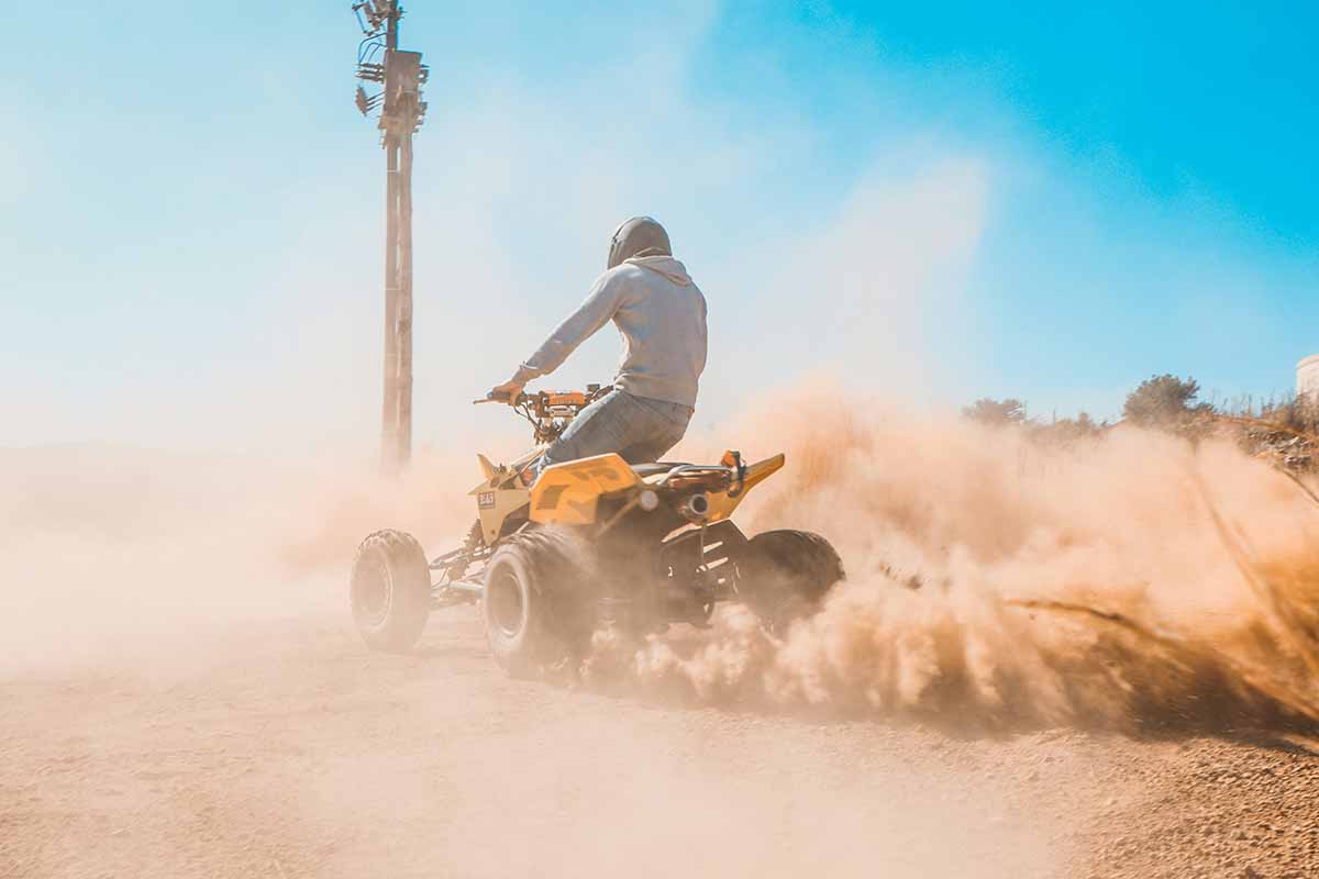 ATV on desert sand.