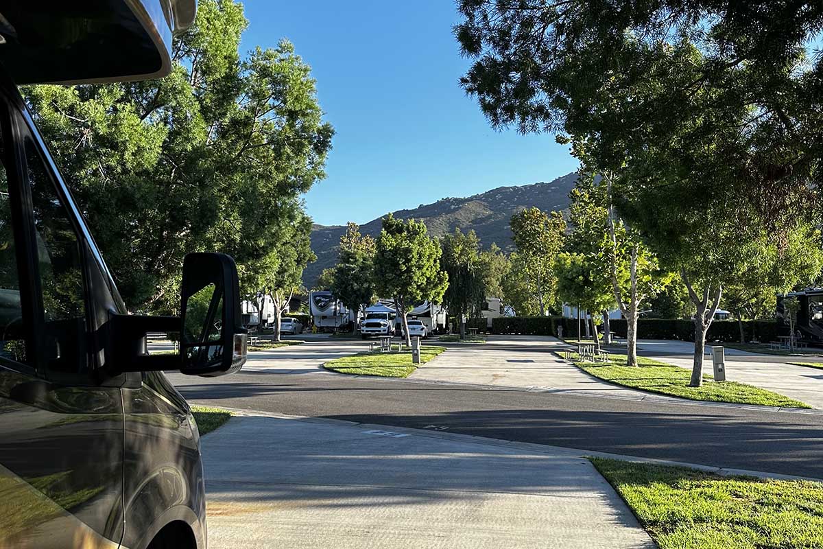 RVs parked on concrete spaces.