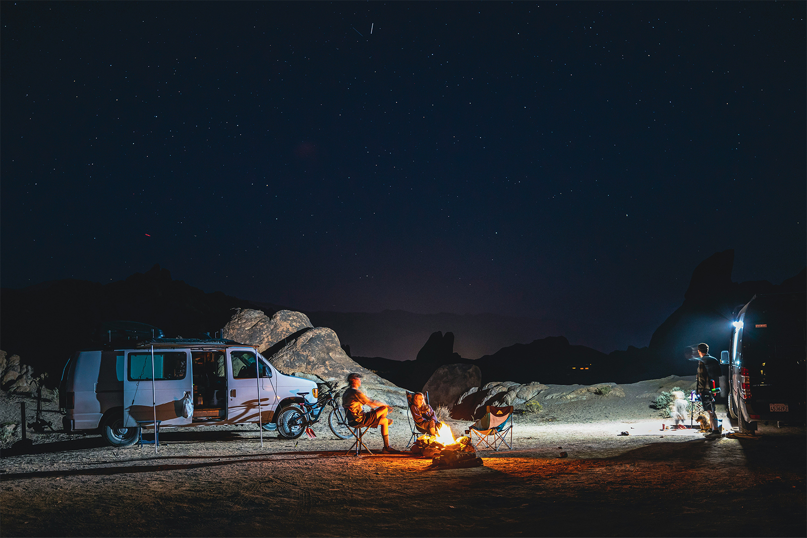Campervan in the desert at night