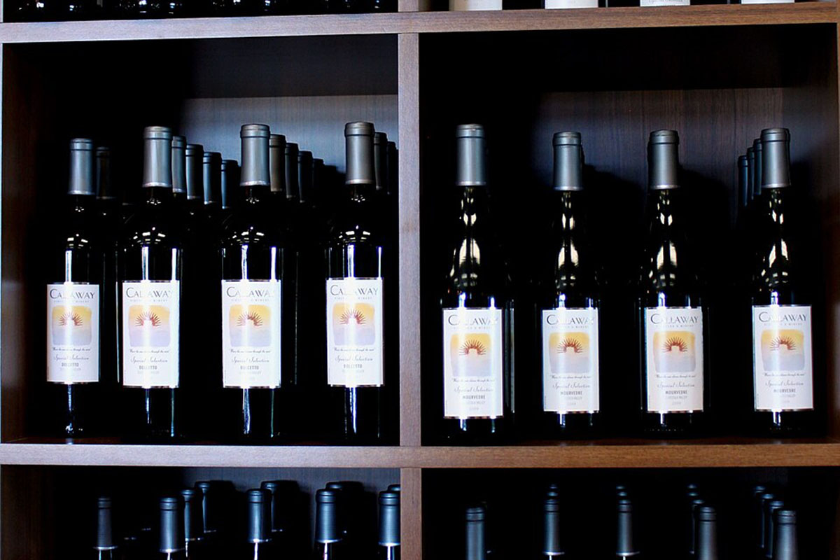 A row of dark wines.