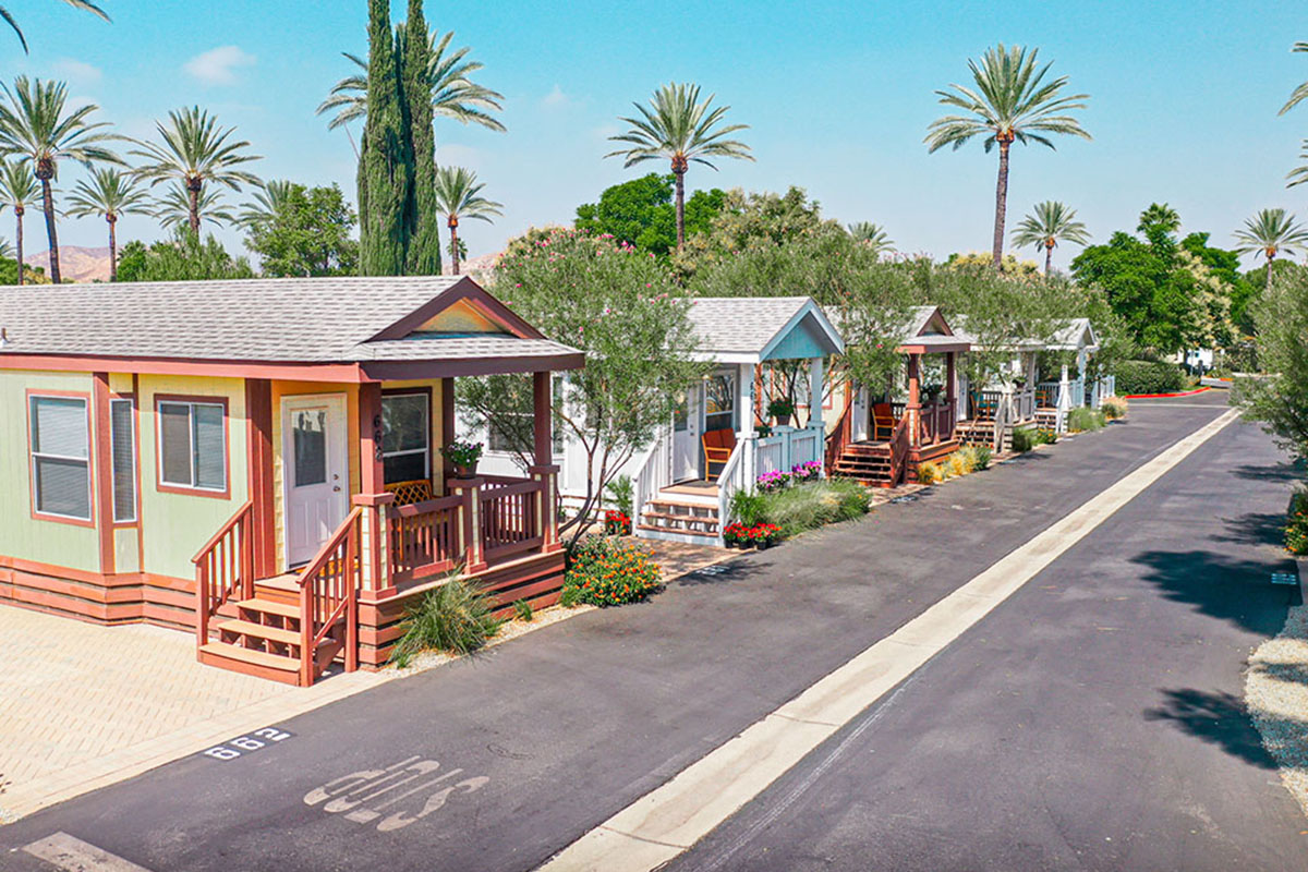 Park model houses lining a street.