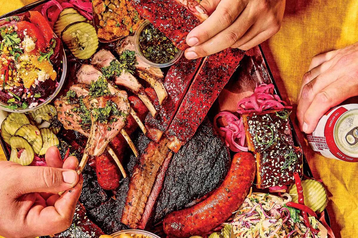 Barbecue feast with a variety of meats.