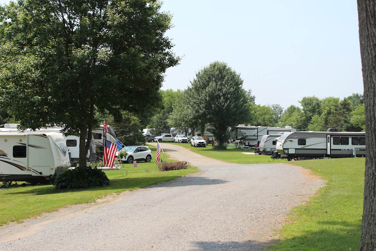 RVs on grassy sites.