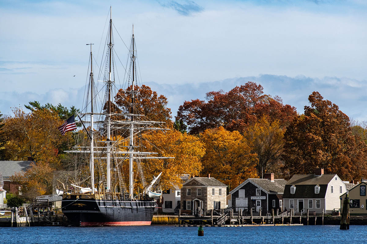 Tall ship in iconic port.