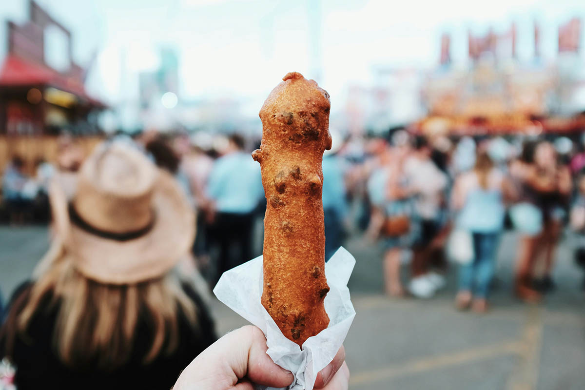 Battered hot dog on a stick.