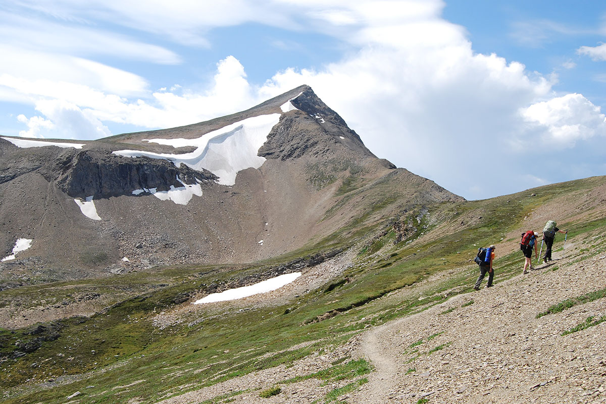Hikers on a desolate ridge.