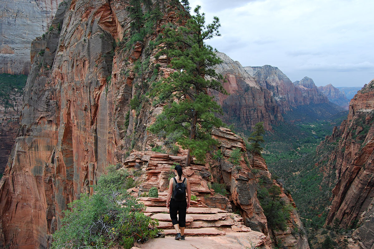 Woman embarks on trail.