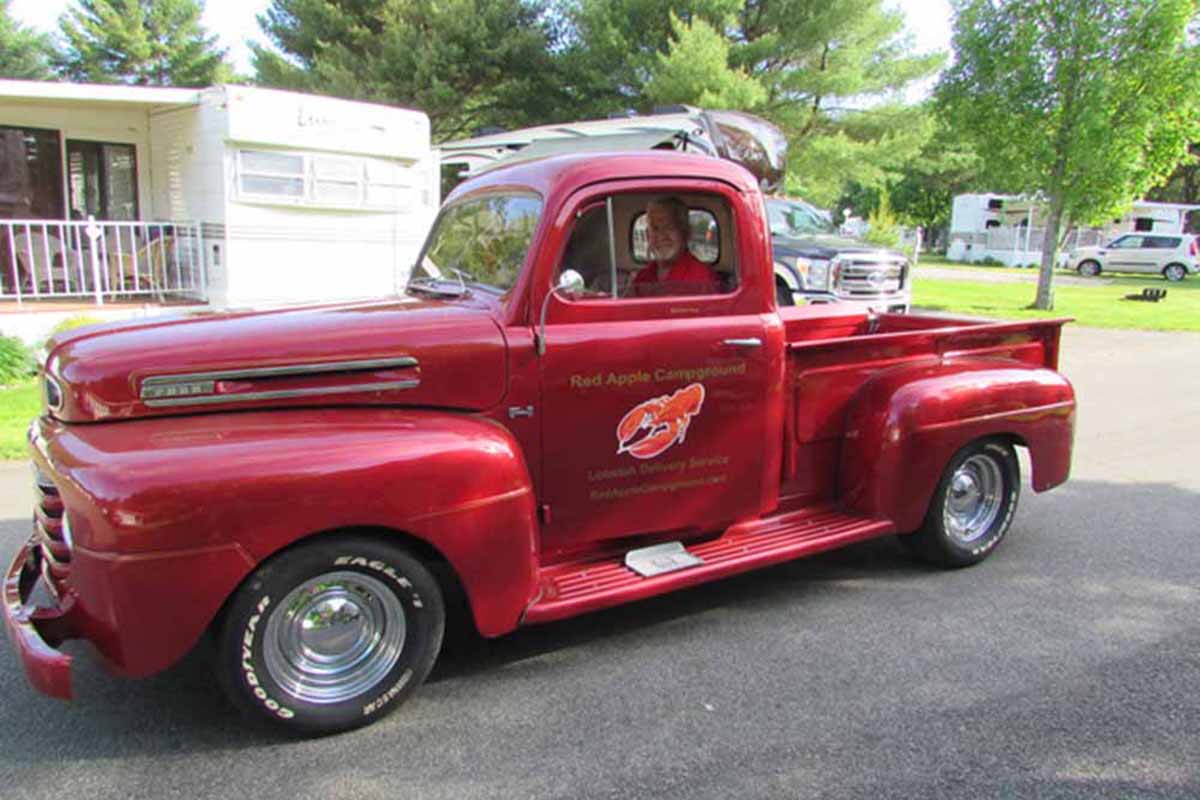 Red truck delivering lobster.