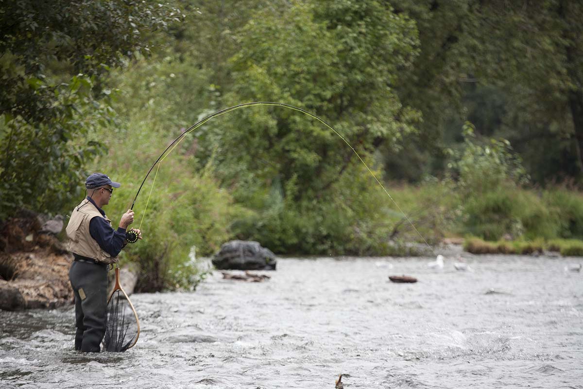 Lone fisherman on a river.