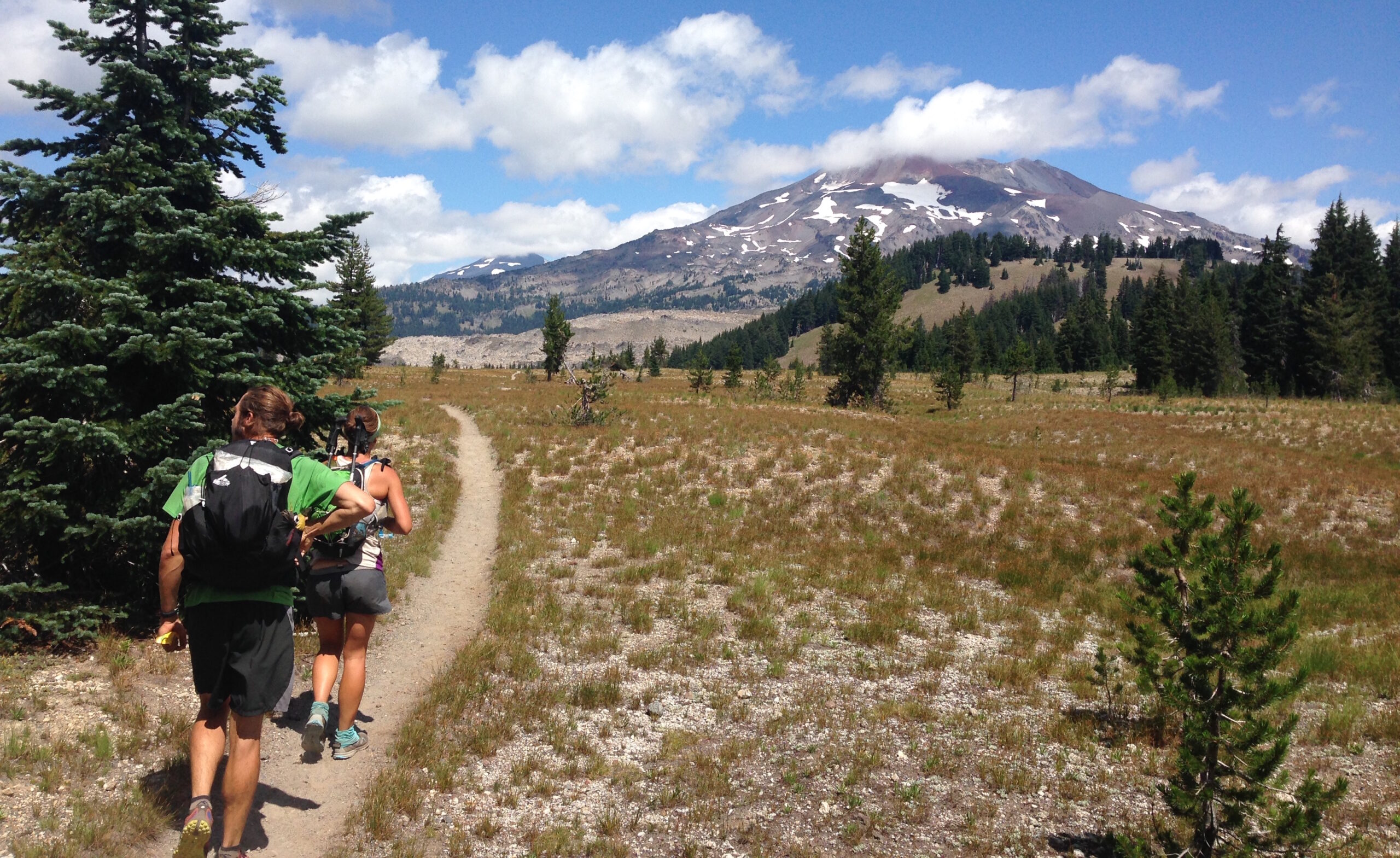 A man and woman hiking.